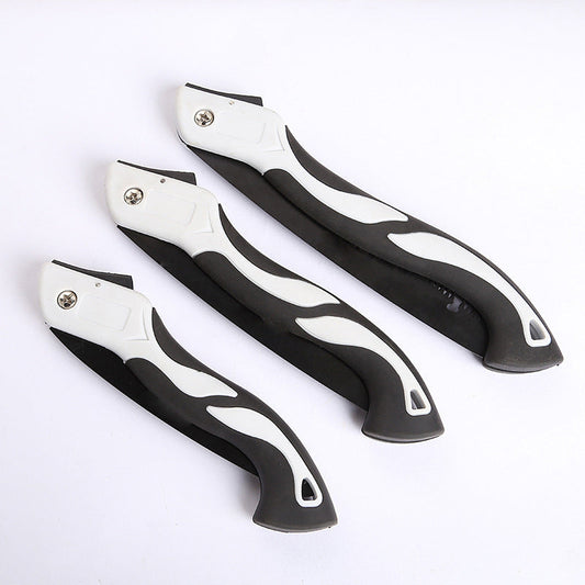 Small handheld folding saw for cutting, ideal for carpentry work