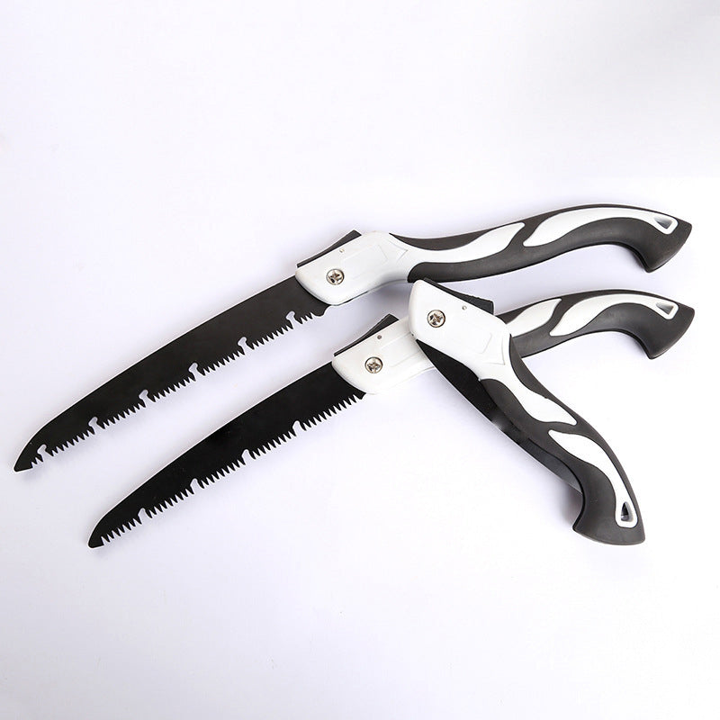 Small handheld folding saw for cutting, ideal for carpentry work