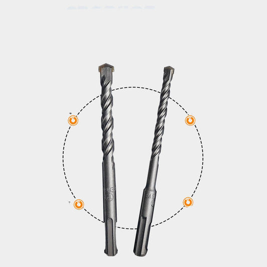 Two-groove, two-slot round shank hammer drill bit for enlarging holes in cement concrete through walls.