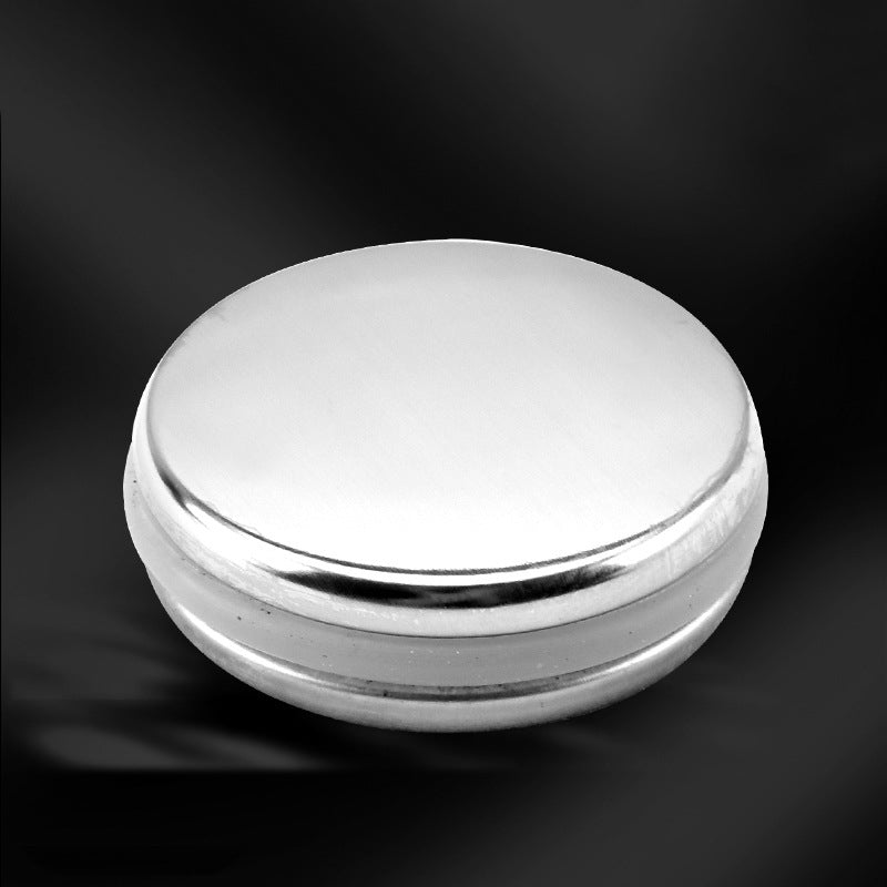 Stainless steel push-button drain plug for washbasins, sinks, and countertops.