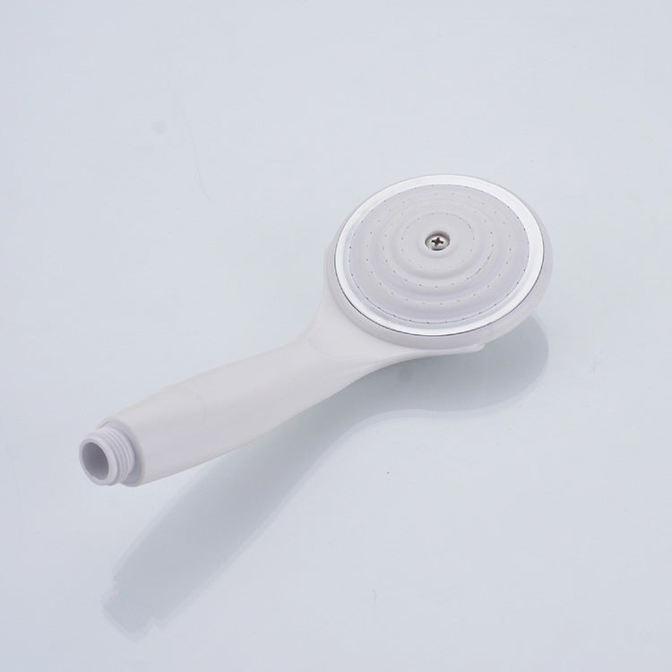 Single-function, drop-resistant handheld shower head/head with pressurization and water-saving features; hot and cold ABS shower head.